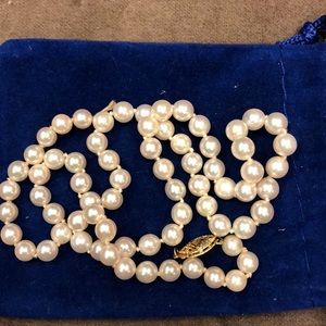 Strand of pearls. 14k clasp. Need to be restrung